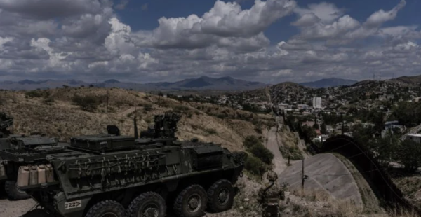 Detienen a hombre escalando el muro entre EU y México; el Ejército activa alerta